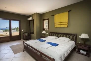 Dormitorio 1 Casa Good Aguila Rent a Villa