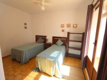 Una de las habitaciones de la casa Atina Inmobiliaria