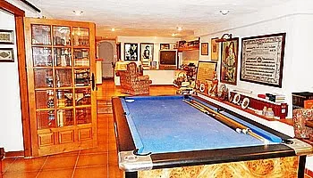 Salón de juegos de la casa del Puchol Marinabay Homes