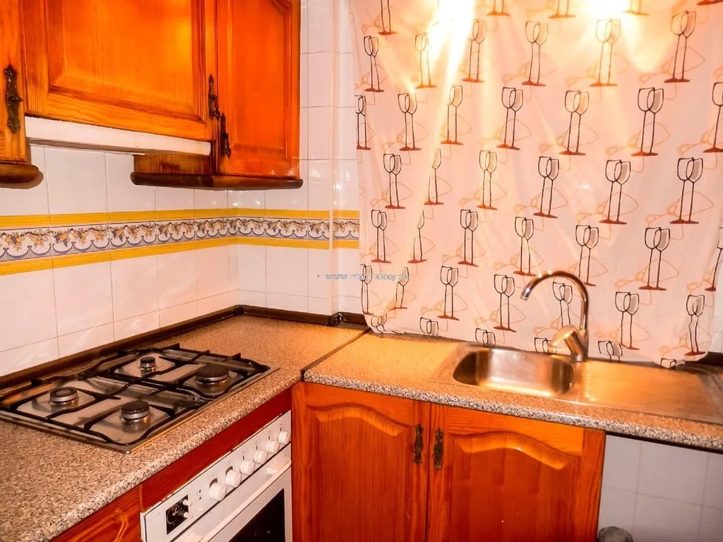 Cocina del apartamento en venta MarinaBay Homes