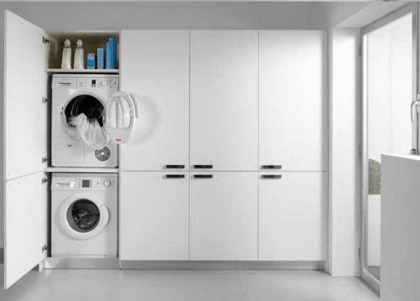 Lavadora oculta en Carpintería Fusta