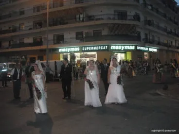 Los mayorales en la ofrenda de flores
