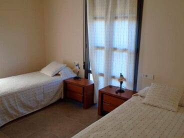 Uno de los dormitorios Casa Nova Villas