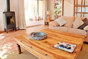 Salón con chimenea Javea Home Finders