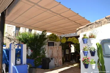 Patio con toldo Toldos Teo