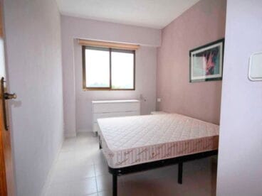 Dormitorio de la casa Atina Inmobiliaria