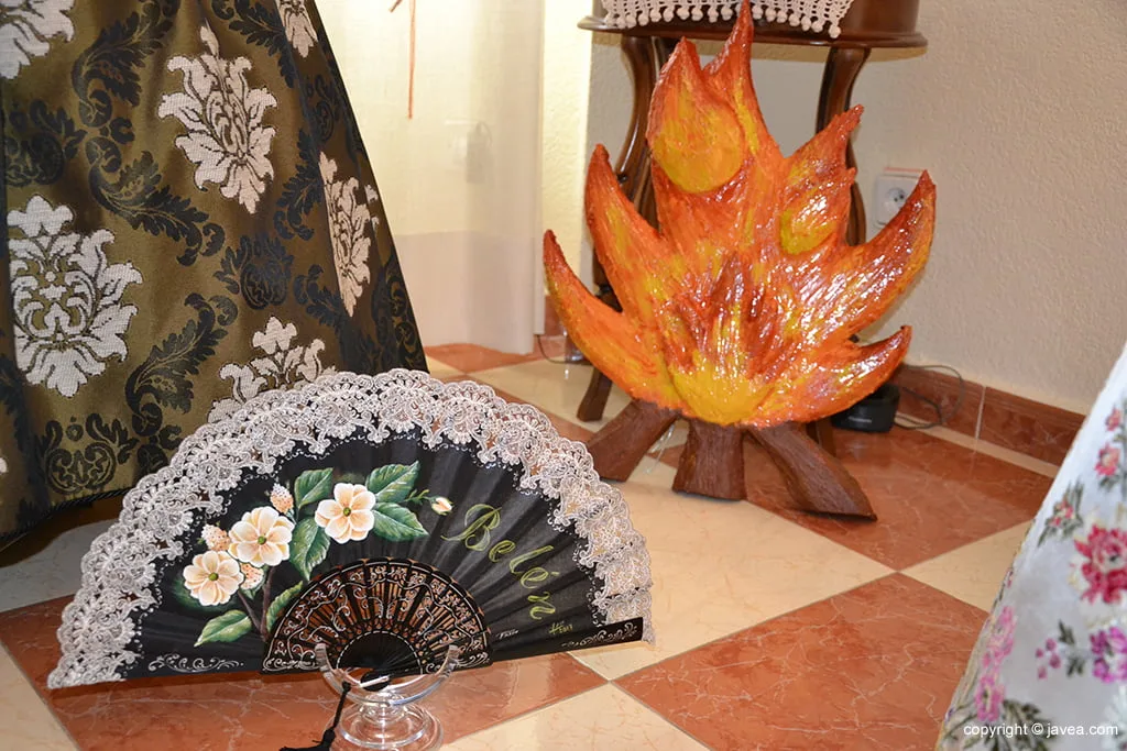 Abanico y Fuego que marcará el portal de su salida
