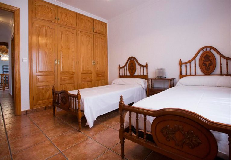 Dormitorio doble Casa Monica Aguila Rent a Villa