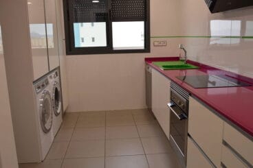 Cocina roja Reformas Integrales Macamon