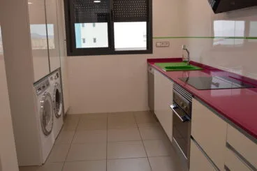 Cocina roja Reformas Integrales Macamon