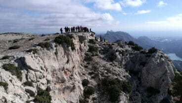 Haciendo cima en la Malla dels Llops