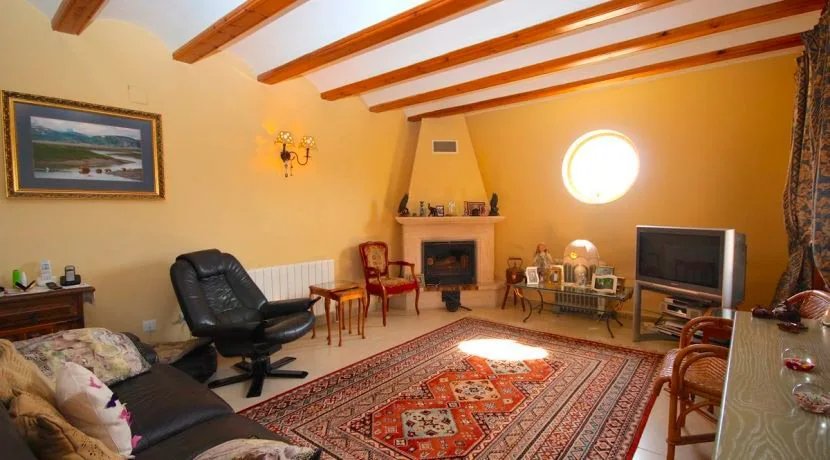 Sala de estar con chimenea Property Finder Spain