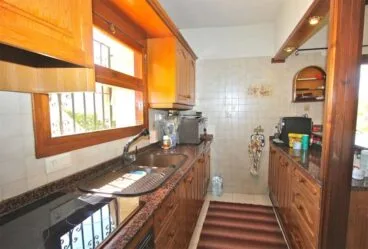 Cocina con barra americana Villadom Spain