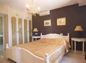Dormitorio con aire acondicionado Vicens Ash Properties