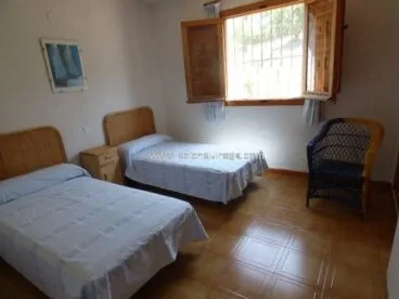 Habitación dos camas chalet Inmobiliaria Belen Quiroga