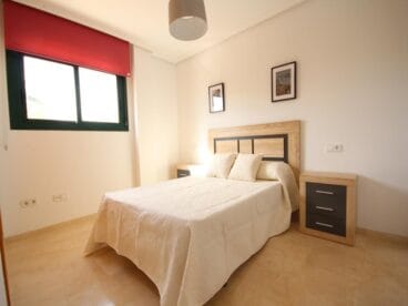 Dormitorio doble del apartamento de Atina Inmobiliaria