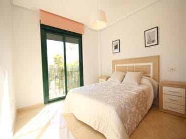 Dormitorio doble del apartamento de Atina Inmobiliaria