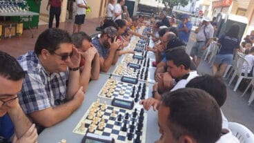 Jugadores ante los tableros