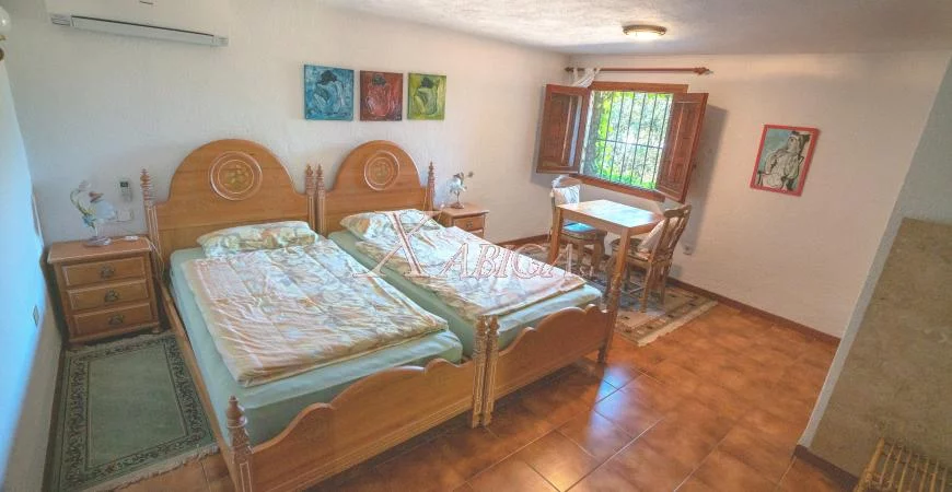 Dormitorio en un chalet en venta en Jávea – Xabiga Inmobiliaria