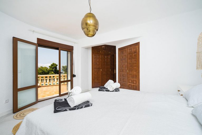 Chambre principale dans une villa en location de vacances - Aguila Rent a Villa