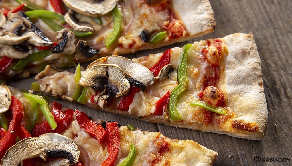 Imagen: Porciones de pizza - Restaurante Ammos