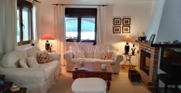 Salón de una casa en venta en Jávea – Xabiga Inmobiliaria