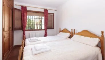 Una de las habitaciones de un alquiler vacacional en Jávea – Quality Rent a Villa