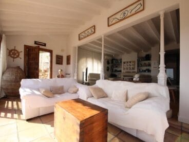 Salón de una villa en venta en El Tosalet en Jávea – Atina Inmobiliaria