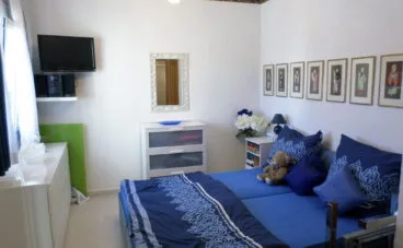 Dormitorio de una villa en venta junto al campo de golf La Sella – Promociones Denia, S.L.