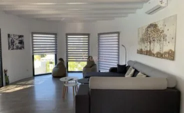 Espacioso salón de un chalet en venta en Jávea – Xabiga Inmobiliaria