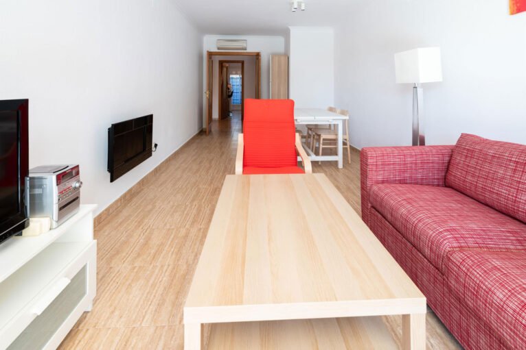Salón de un apartamento de vacaciones en Jávea con capacidad para cuatro personas - Quality Rent a Villa