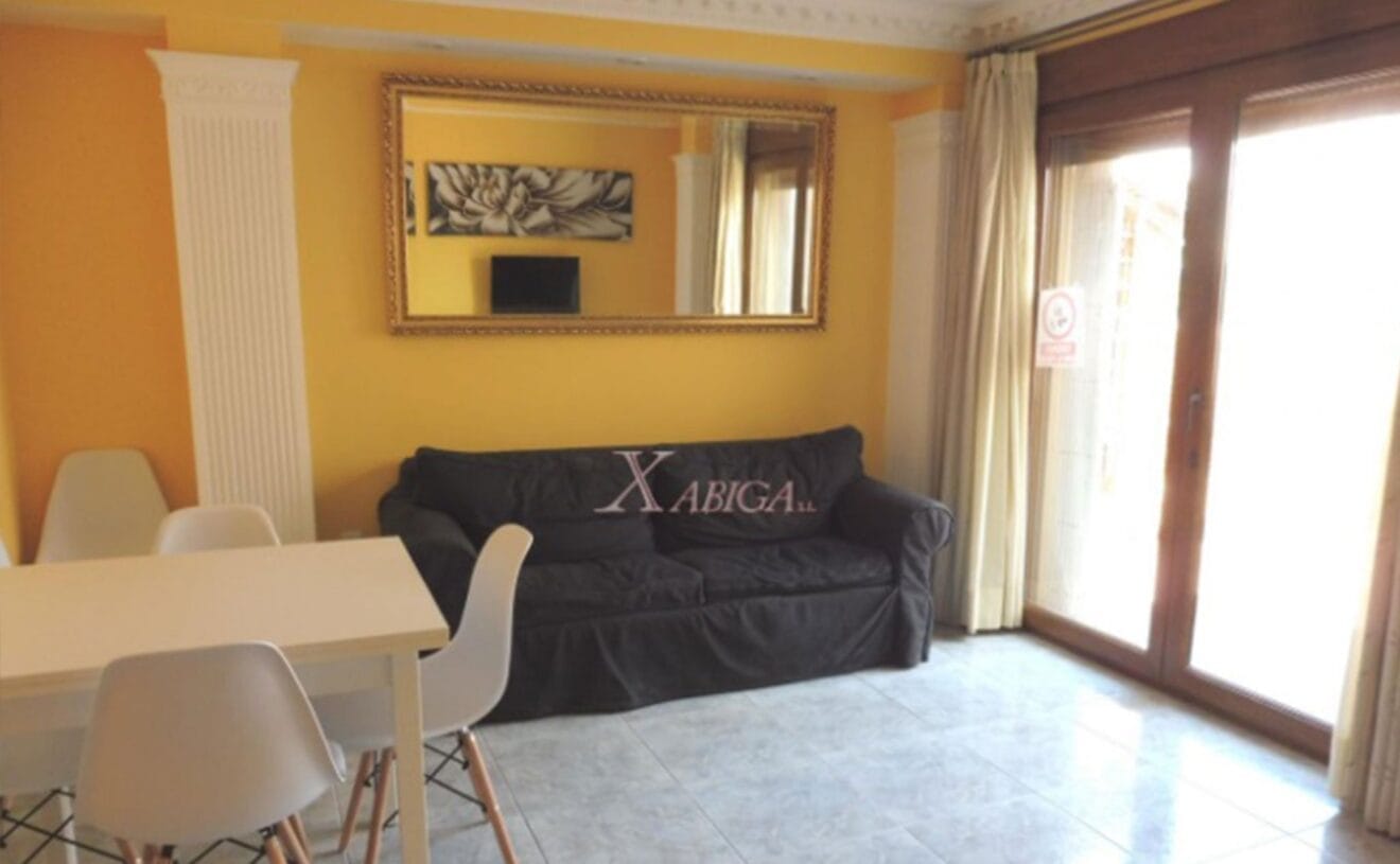 Comedor de una casa de pueblo en venta en el puerto de Jávea - Xabiga Inmobiliaria