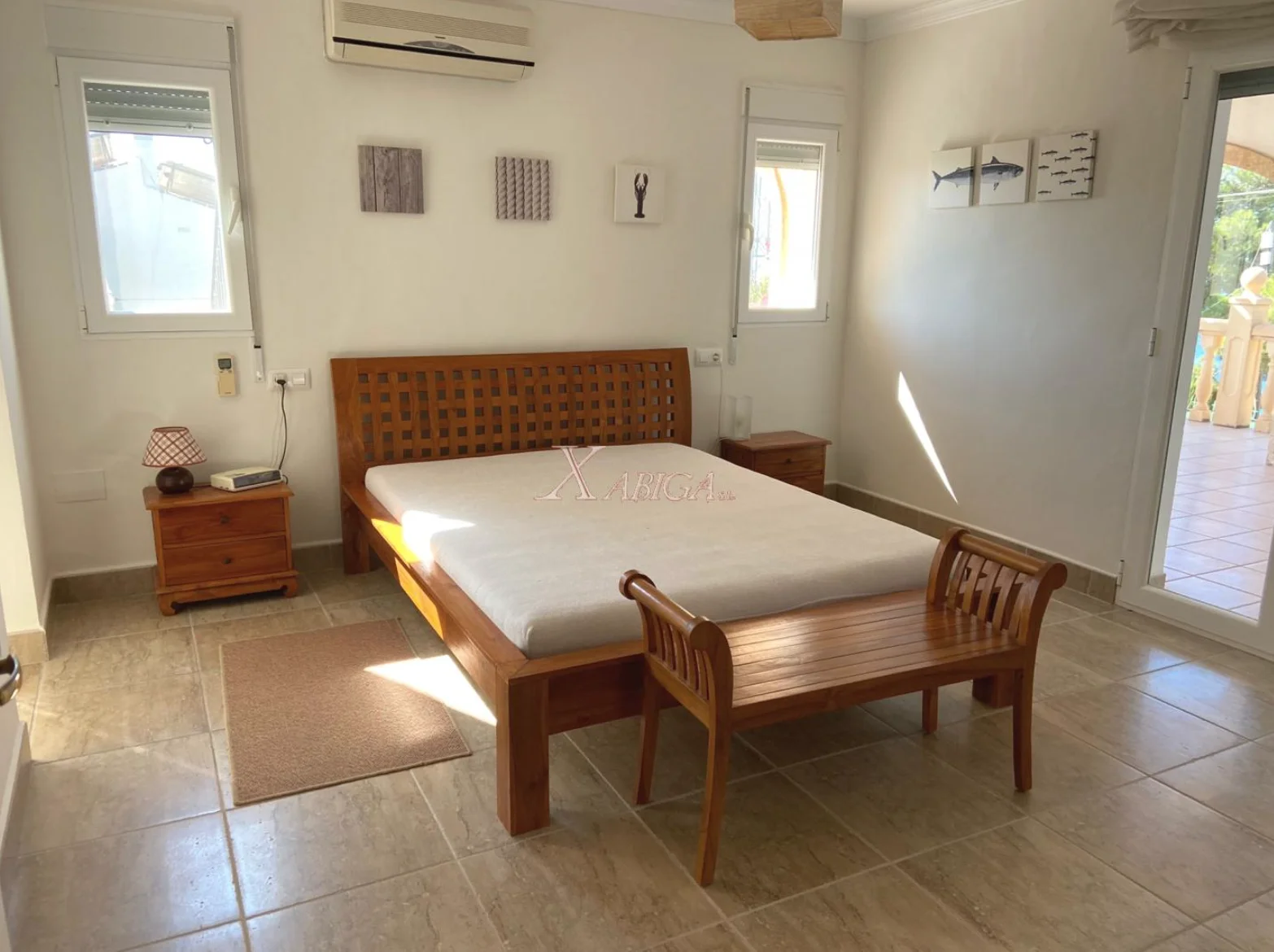 Dormitorio de casa con vistas al mar en Jávea -Xabiga Inmobiliaria