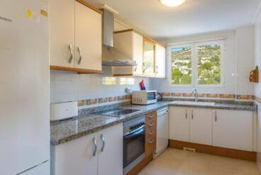 Cocina del apartamento disponible con Vicens Ash Properties