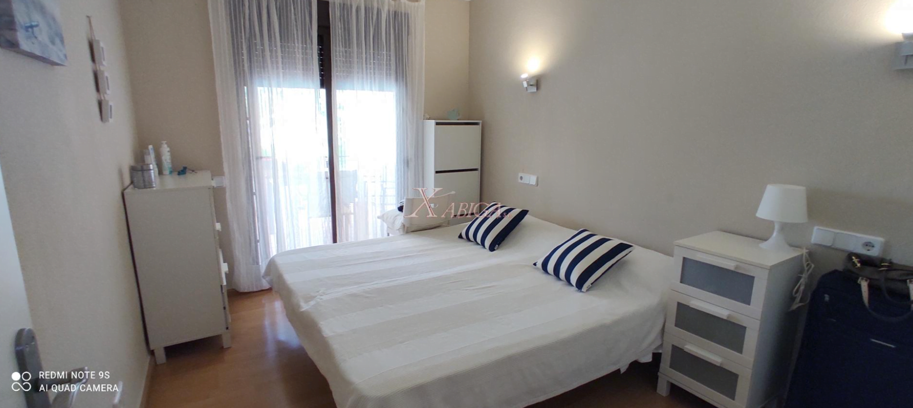 Dormitorio del apartamento en Jávea disponible con Xabiga Inmobiliaria
