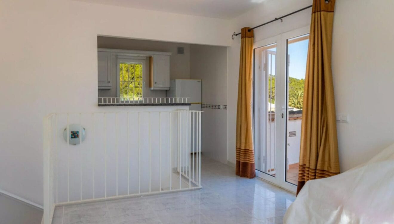 Planta superior con cocina y terraza