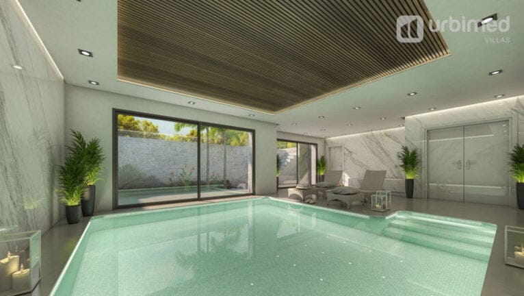 Piscina interior con zona de descanso
