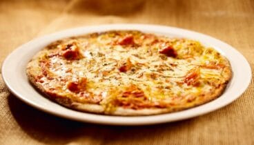 Pizzas italianas con base de tomate o de nata