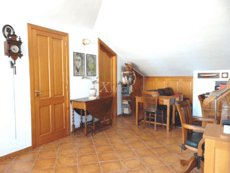 Buhardilla de la vivienda con zonas de estudio