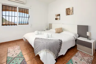 Dormitorio doble con vistas al mar