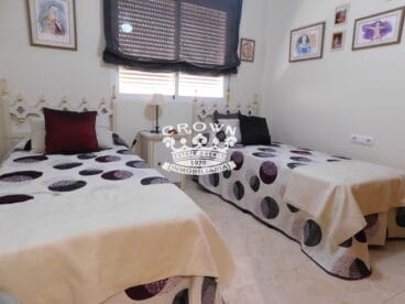 Dormitorio doble con dos camas individuales