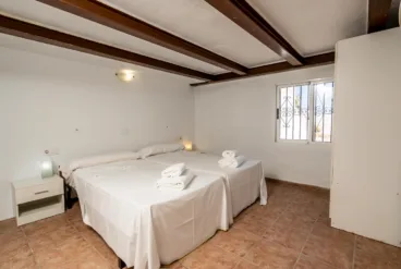 Dormitorio de la casa abuhardillado