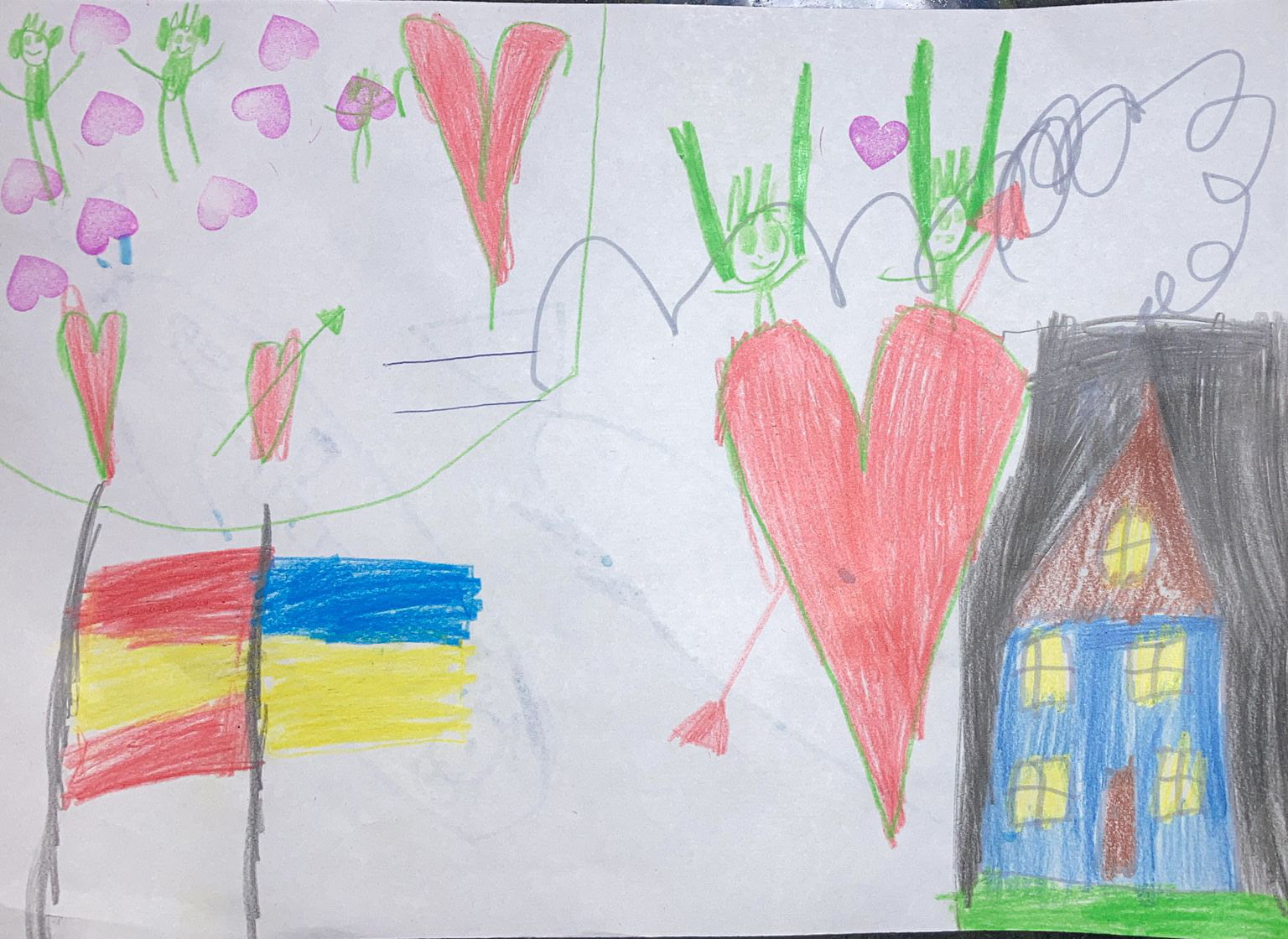 Dibujo del hijo de Kateryna que representa la bandera ucraniana y española unidas