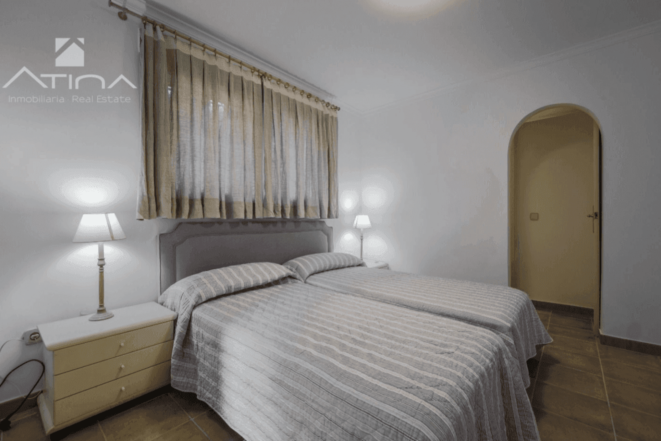 Dormitorio doble equiopado con dos camas individuales
