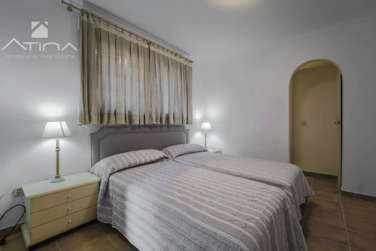 Dormitorio doble equiopado con dos camas individuales