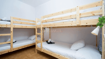 Dormitorio doble con literas
