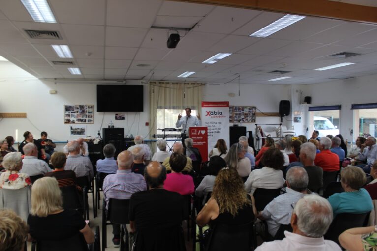 The Minister of Health at the event of the PSOE with the Association of Retirees
