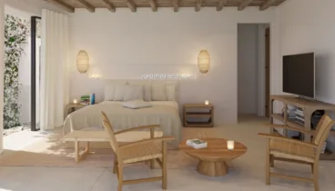 Dormitorio amplio y luminoso con tv y cuarto de baño