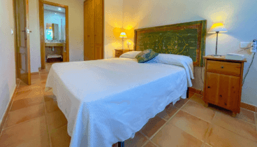 Dormitorio principal con baño en suite