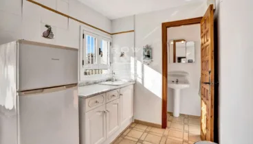 Cocina acogedora de la vivienda independiente
